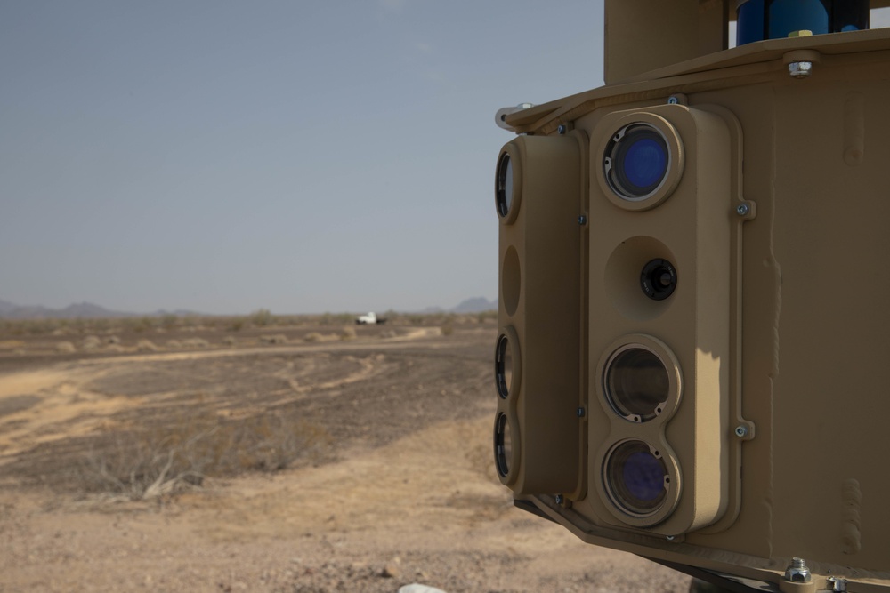 An unmanned ground vehicle equppied with a high-grade camera, is prepared to go on a test run during the Project Convergence capstone event at Yuma Proving Ground, Arizona, Aug. 11 – Sept. 18, 2020.