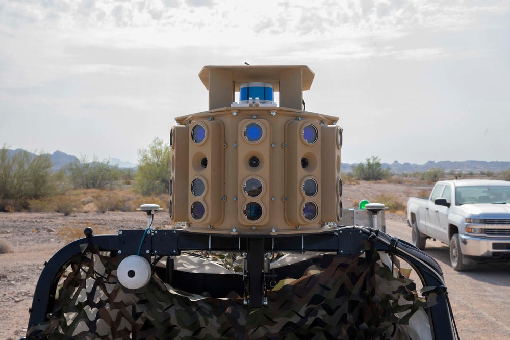 An unmanned ground vehicle equppied with a high-grade camera, is prepared to go on a test run during the Project Convergence capstone event at Yuma Proving Ground, Arizona, Aug. 11 – Sept. 18, 2020.