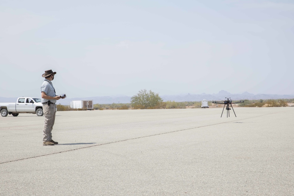 Edward Findley, test pilot for AI Task Force Umanned Surveillance System, from Carnegie Mellon University, tests an unmanned aerial system during the Project Convergence capstone event at Yuma Proving Ground, Arizona, Aug. 11 – Sept. 18, 2020.
