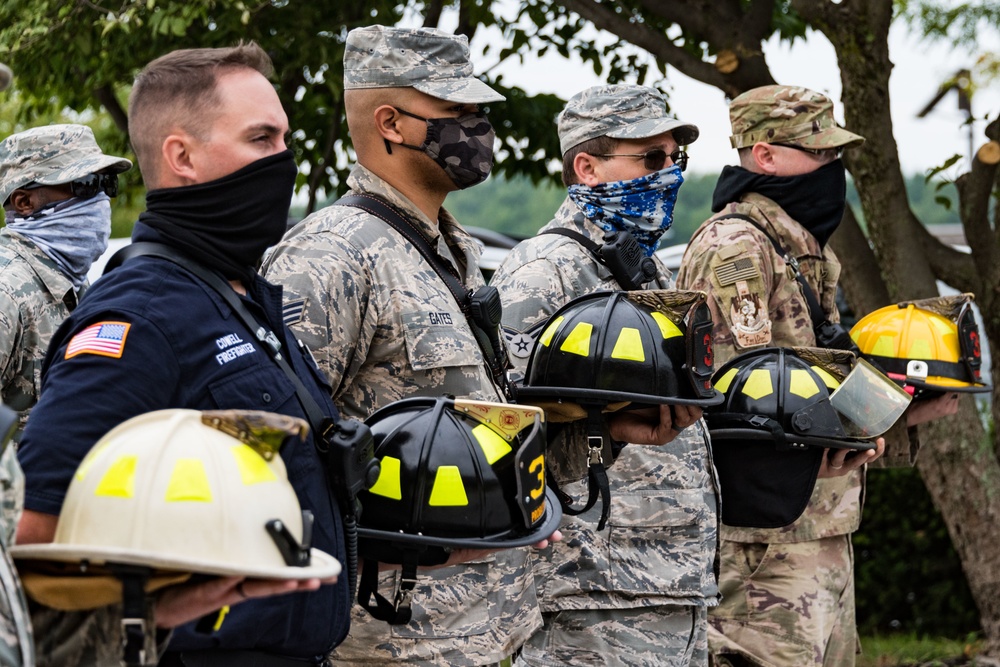 166th Airlift Wing Airmen and firefighters commemorate the anniversary of 9/11.