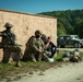 410th Military Police Company aids wounded during mock riot in Combined Resolve XIV