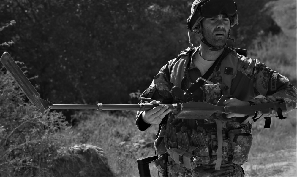 Italian soldiers conduct an IED sweep during Combined Resolve