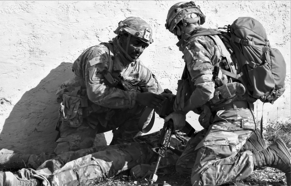 U.S. Army Soldiers evaluate a casualty during Combined Resolve