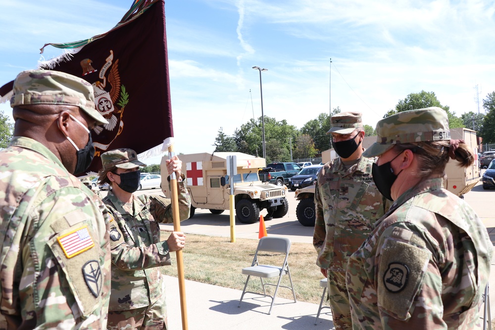 First women to pass the battalion colors in change of command ceremony in the Iowa Army National Guard