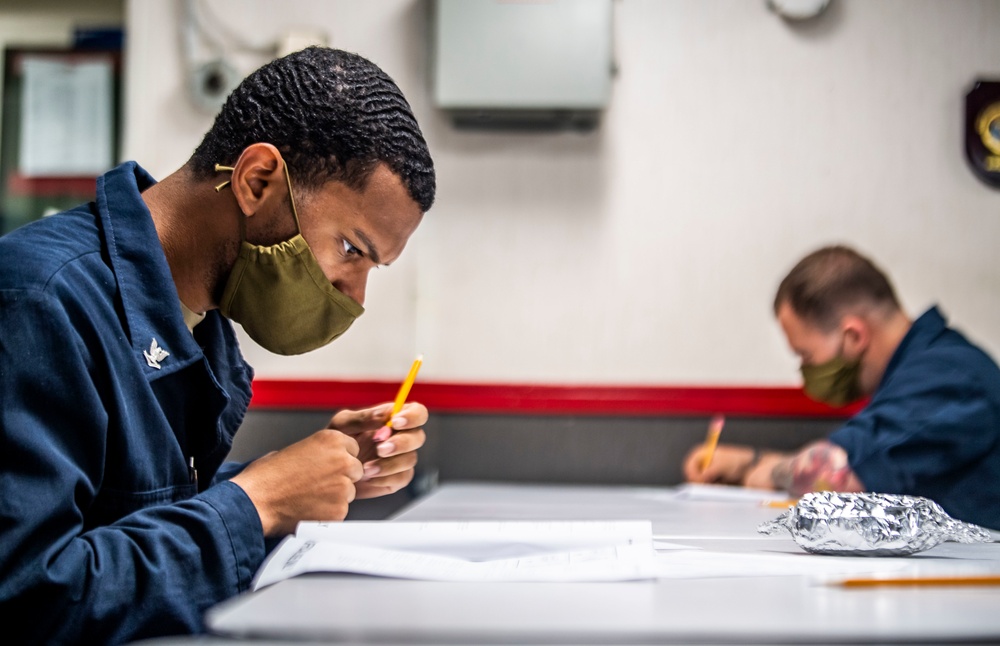 Sailors Aboard USS Germantown (LSD 42) Take the 2nd Class Petty Officer Advancement Exam