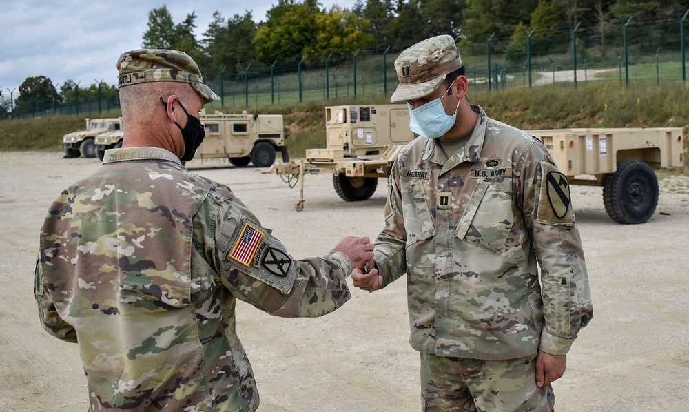 U.S. Army Europe Commanding General coins Soldiers during Combined Resolve XIV