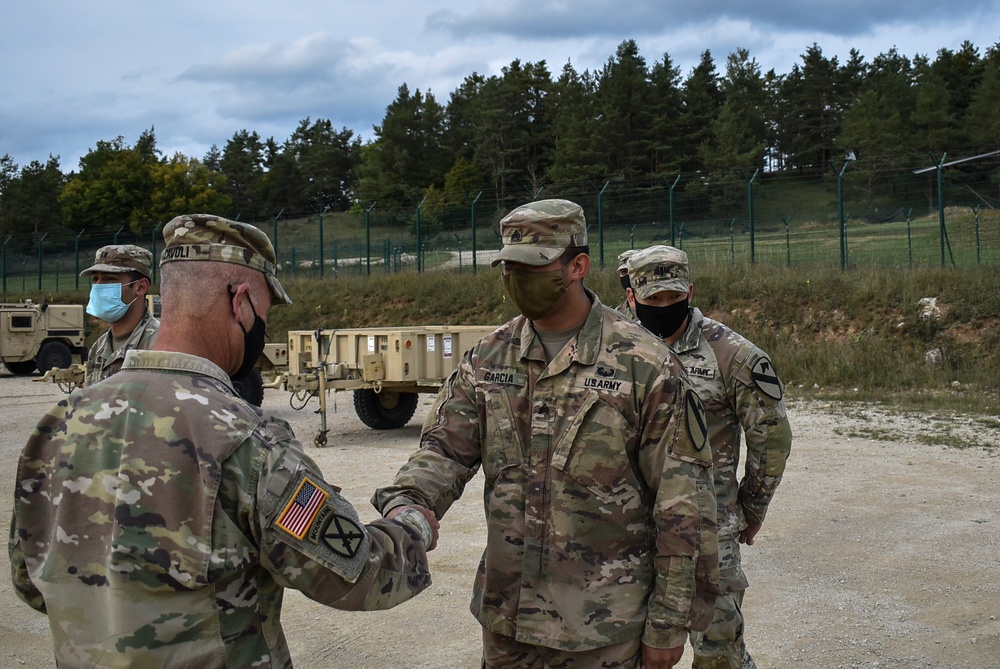 U.S. Army Europe Commanding General coins Soldiers during Combined Resolve XIV