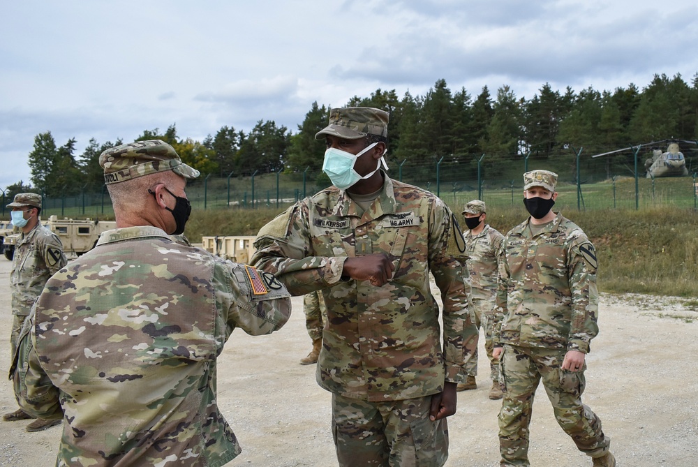 U.S. Army Europe Commanding General coins Soldiers during Combined Resolve XIV