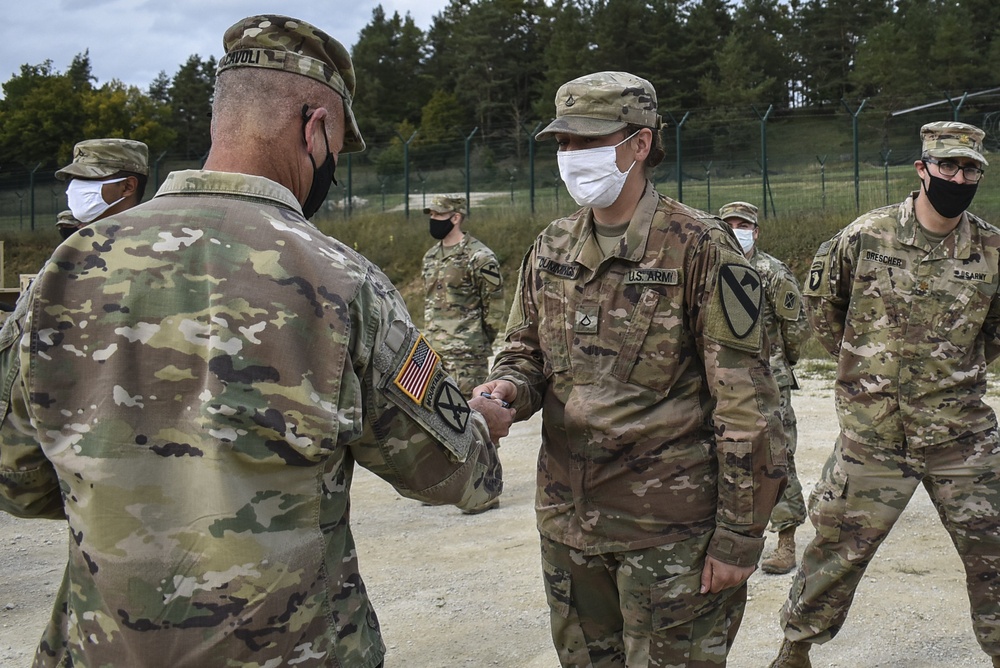 U.S. Army Europe Commanding General coins Soldiers during Combined Resolve XIV
