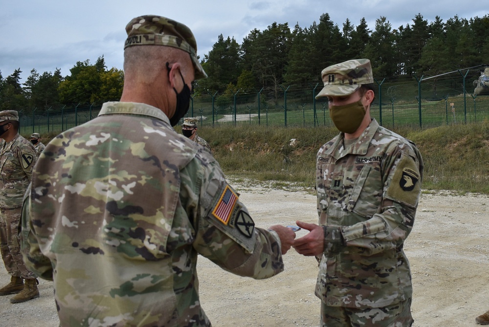 U.S. Army Europe Commanding General coins Soldiers during Combined Resolve XIV