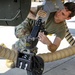 A U.S. Army Soldier, secures landing equiptment on a Grey Eagle autonomous weapons system, during Project Convergence 20, a demonstartion of modernized warfare capabilities, at Yuma Proving Ground, Arizona, September 17, 2020.