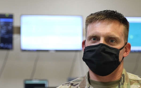 Maj. Stephen Kirchhoff, lead Network Planner, assigned to the U.S. Army Network-Cross Functional Team, participates in an interview, discussing the significance of the Project Convergence 20 demonstration, at Yuma Proving Groun, Arizona.