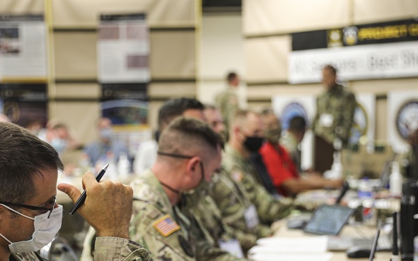 U.S. Army Soldiers, alongside Department of Defense contractors, assembled during Project Convergence 20, to initiate testing exercises for new Multi-Domain Operations weapons systems, at Yuma Proving Ground, Arizona, September 17, 2020.