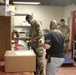 Arizona National Guard Service members help prepare PPE for Mohave County.