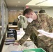 Arizona National Guard Medics give class on PPE to Glendale school district nurses.