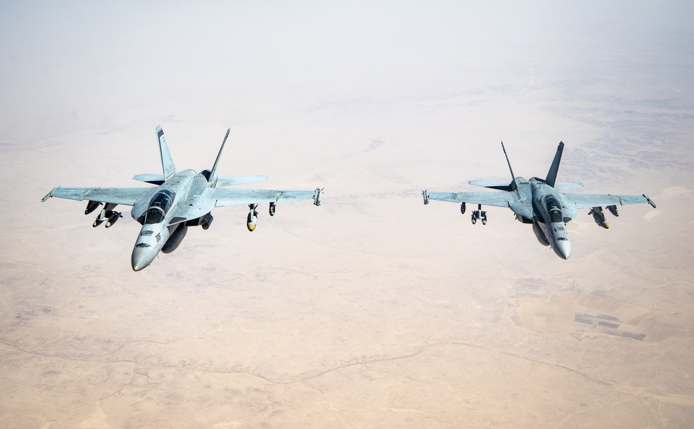 KC-135 refuels F/A-18s in support of Operation Inherent Resolve