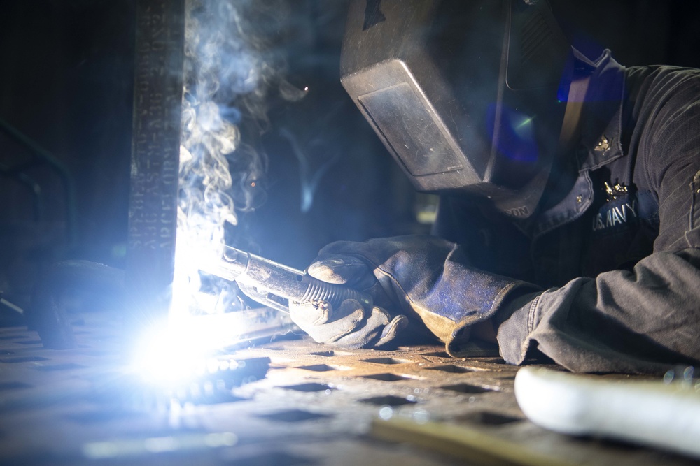 USS America Hull Maintenance Technician Practices Welding