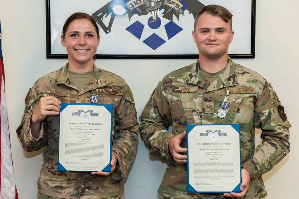 310th Space Wing combat arms instructors prevent serious injury during weapons training