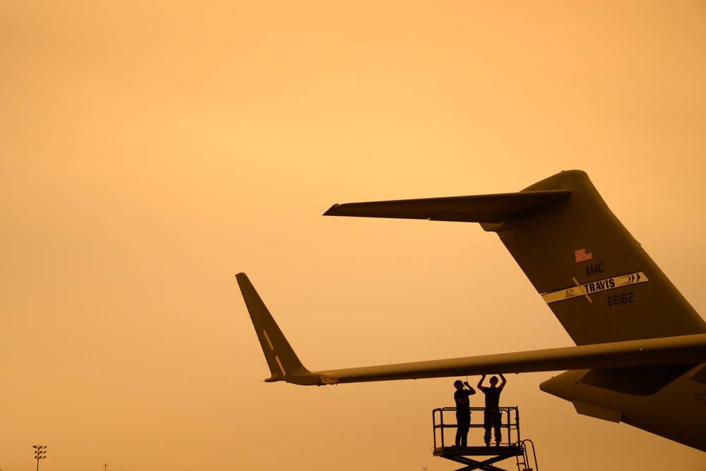 Wildfires across California propelled ash and smoke above Travis AFB