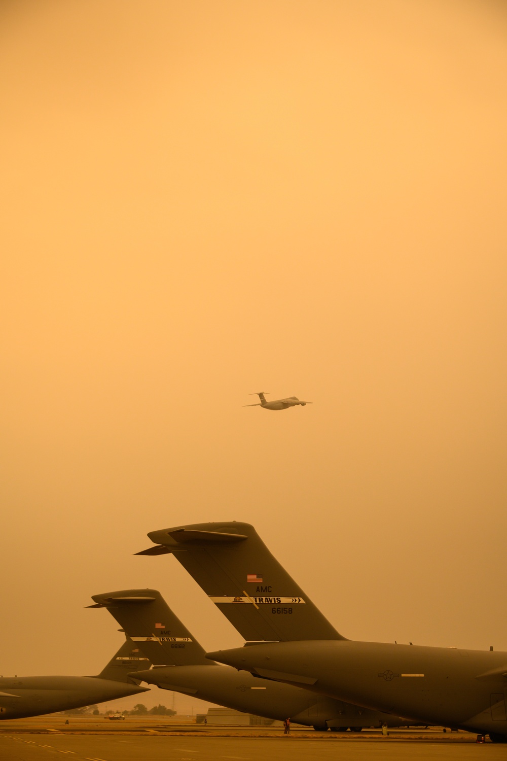 Wildfires across California propelled ash and smoke above Travis AFB