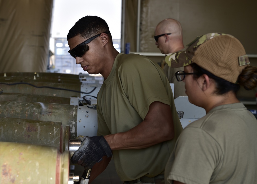 Munitions Airmen build munitions for follow-on forces