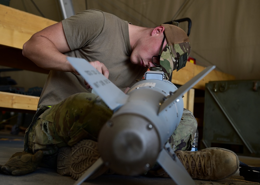 Munitions Airmen build munitions for follow-on forces