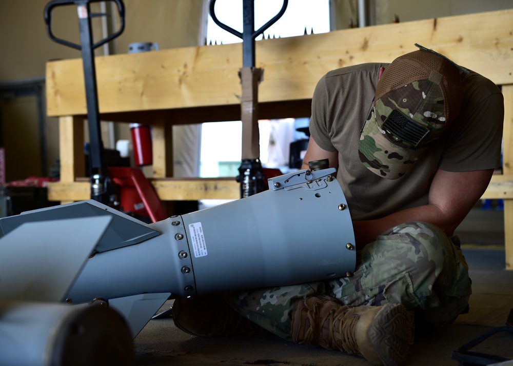 Munitions Airmen build munitions for follow-on forces