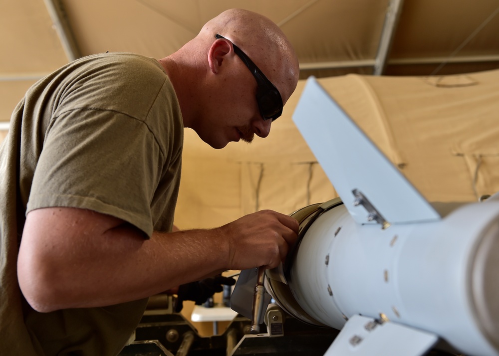 Munitions Airmen build munitions for follow-on forces