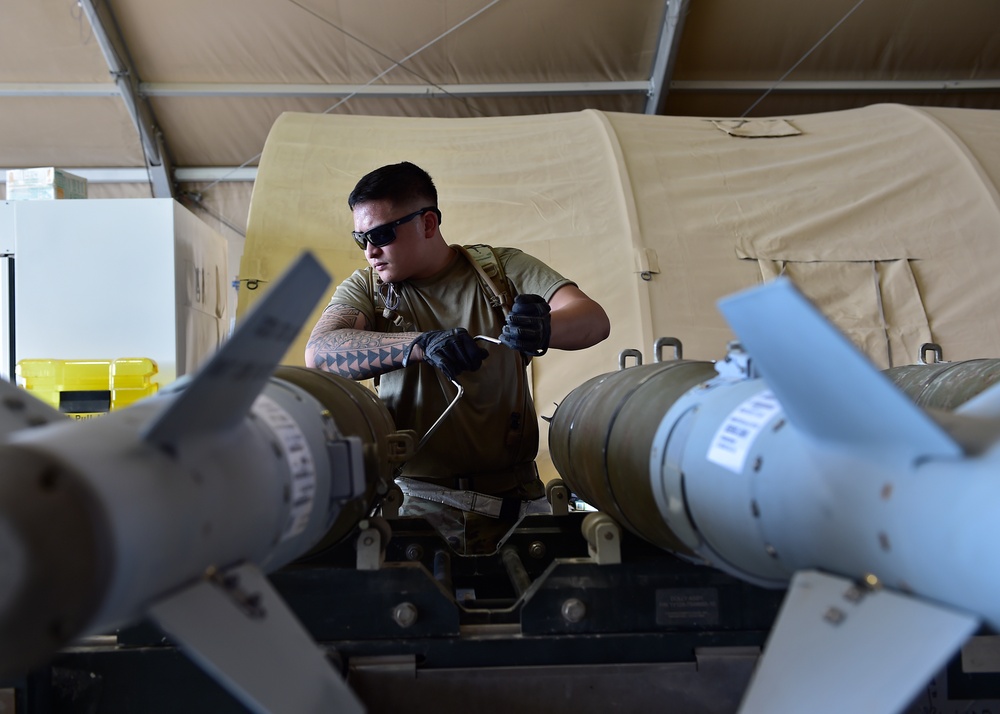 Munitions Airmen build munitions for follow-on forces