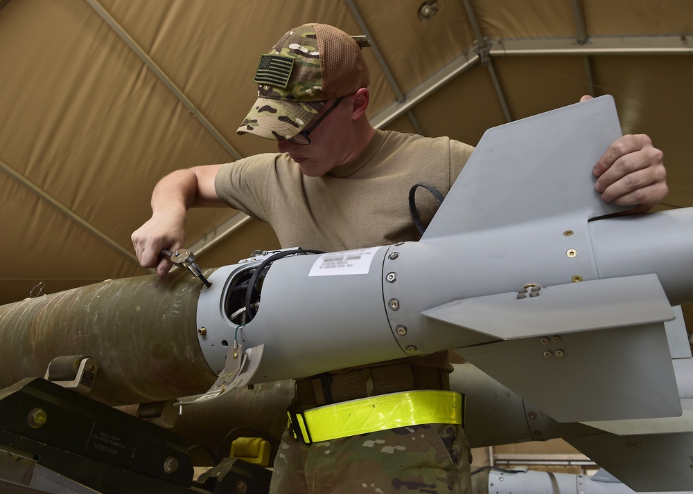 Munitions Airmen build munitions for follow-on forces