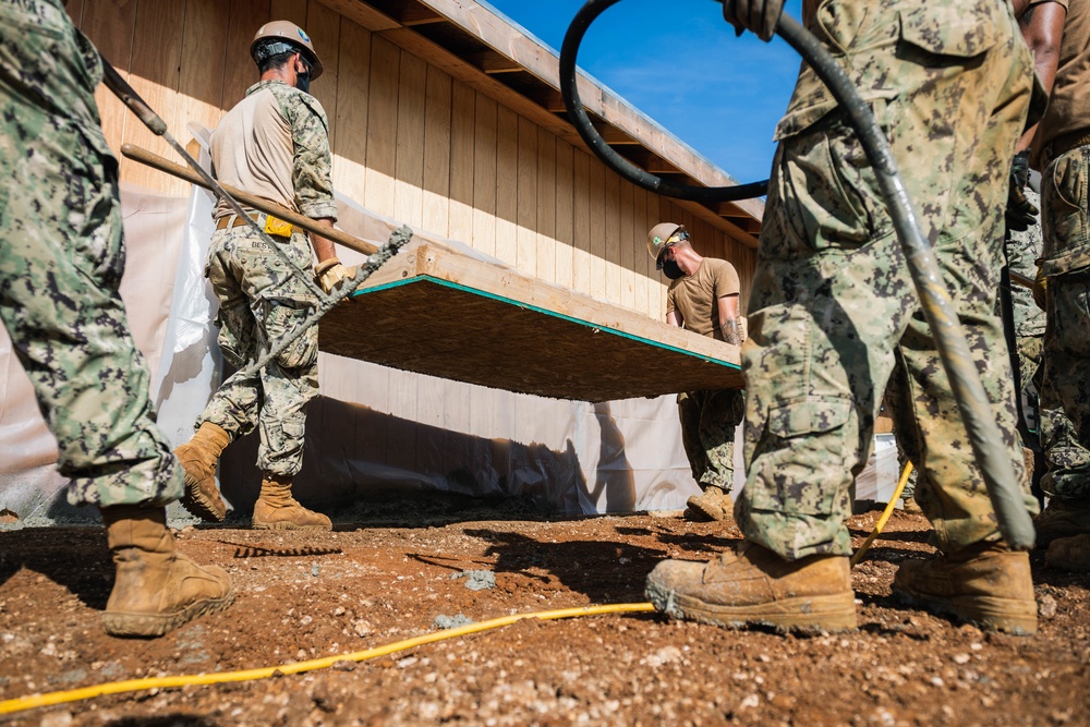 NMCB 3 Pours Concrete in Southwest Asia Huts on Camp Tinian