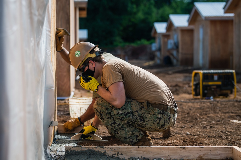 NMCB 3 Pours Concrete in Southwest Asia Huts on Camp Tinian