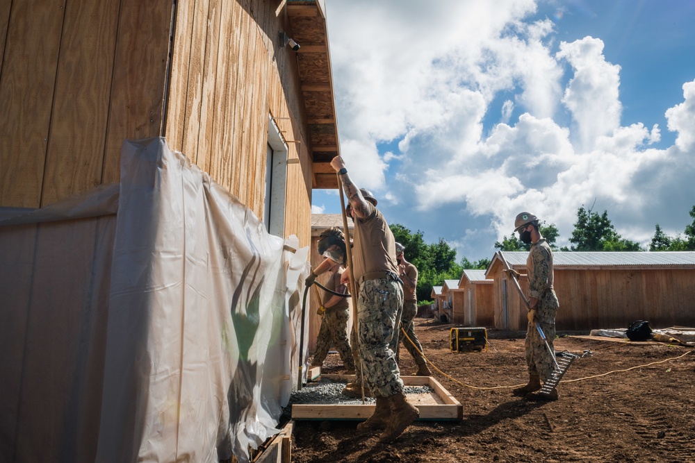 NMCB 3 Pours Concrete in Southwest Asia Huts on Camp Tinian