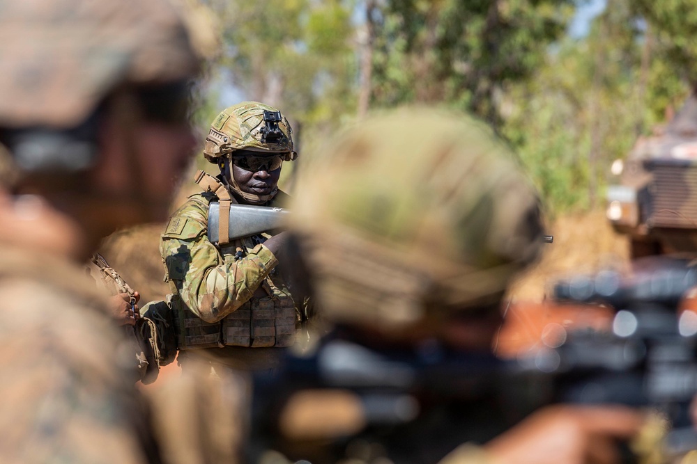 ADF soldiers wield M4s during joint live-fire range