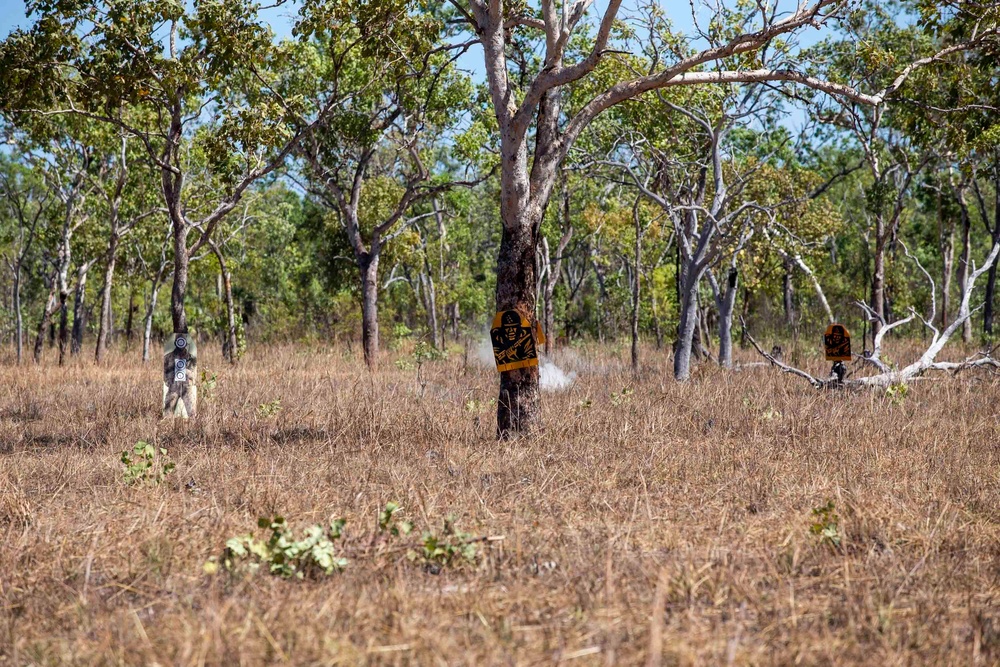 ADF soldiers wield M4s during joint live-fire range