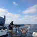 The Arleigh Burke-class guided-missile destroyer USS Ross (DDG 71) participates in a passing exercise (PASSEX) with European counterparts