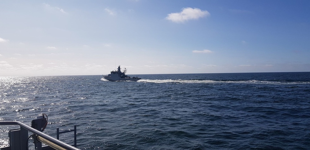 The Lithuanian Navy LNS Aukstaitis (P14) participates in a series of close proximity maneuvering exercises during a passing exercise (PASSEX) with European counterparts