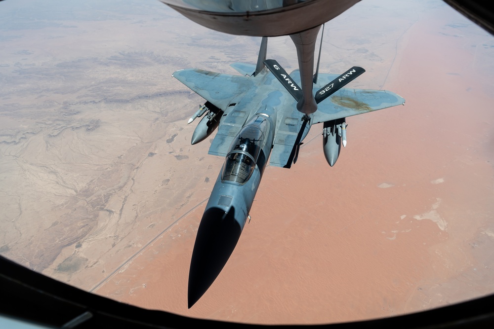 A U.S. Air Force KC-135 Stratotanker refuels F-15C Eagles