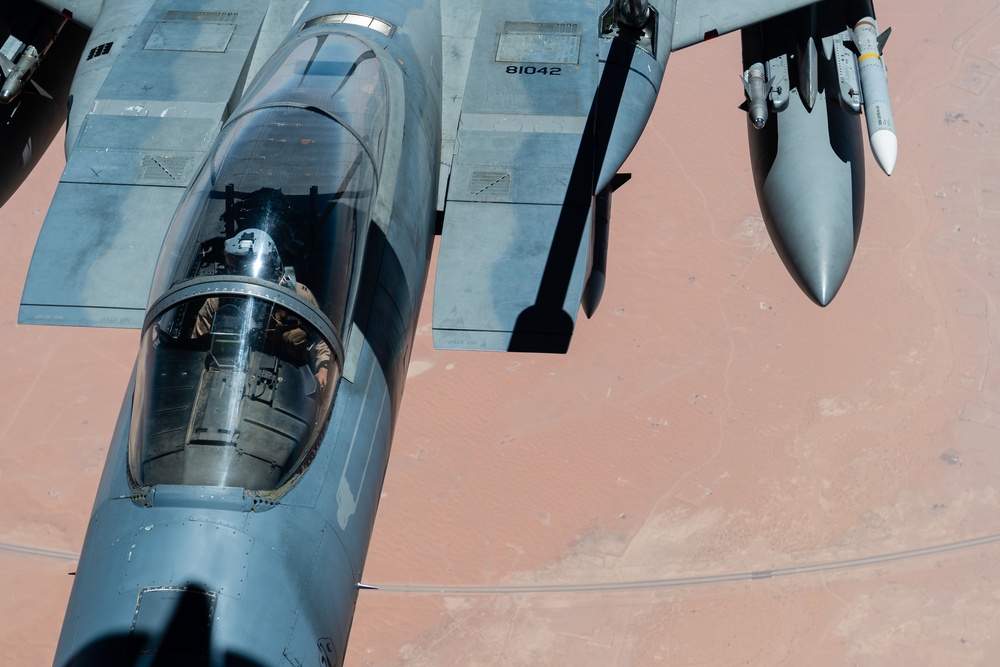 A U.S. Air Force KC-135 Stratotanker refuels F-15C Eagles