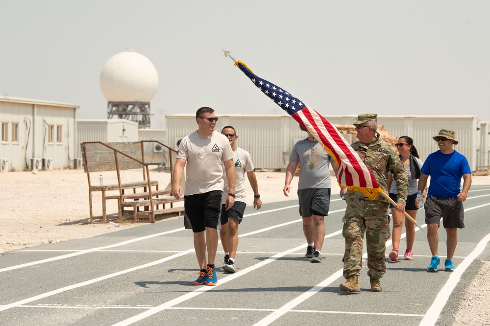 Deployed service members honor 9/11 victims with remembrance walk