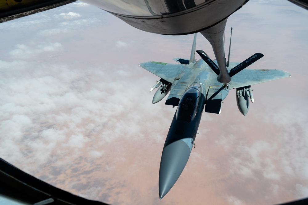 A U.S. Air Force KC-135 Stratotanker refuels F-15C Eagles