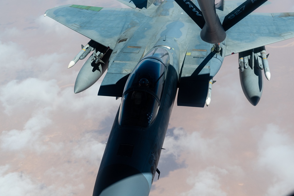 A U.S. Air Force KC-135 Stratotanker refuels F-15C Eagles