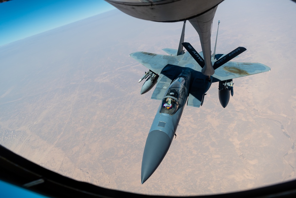 A U.S. Air Force KC-135 Stratotanker refuels F-15C Eagles