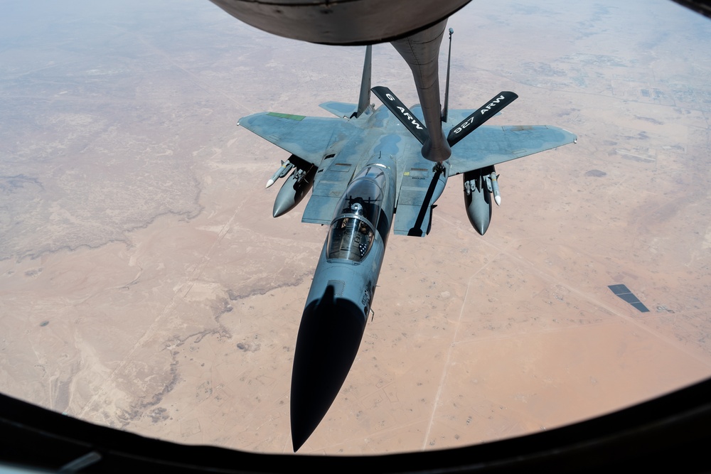 A U.S. Air Force KC-135 Stratotanker refuels F-15C Eagles