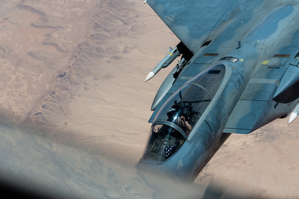 A U.S. Air Force KC-135 Stratotanker refuels F-15C Eagles