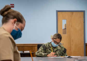 Sailors participate in the Navy-wide E-6 and E-5 Advancement Exam