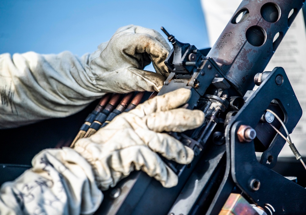 Sailors Participate in a .50-Caliber Live-Fire Exercise Aboard USS Germantown (LSD 42)