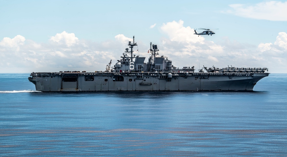 USS Germantown (LSD 42) and USS America (LHA 6) Conduct a RAS with USNS Washington Chambers (T-AKE 11)