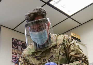 Bright Smiles for Medical Readiness: Maryland Guard Helps Neighboring Guard w/Dental Exams