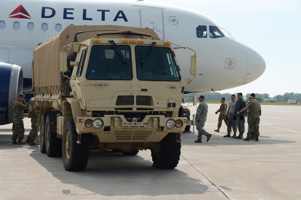 Iowa Guard Soldiers loading bags